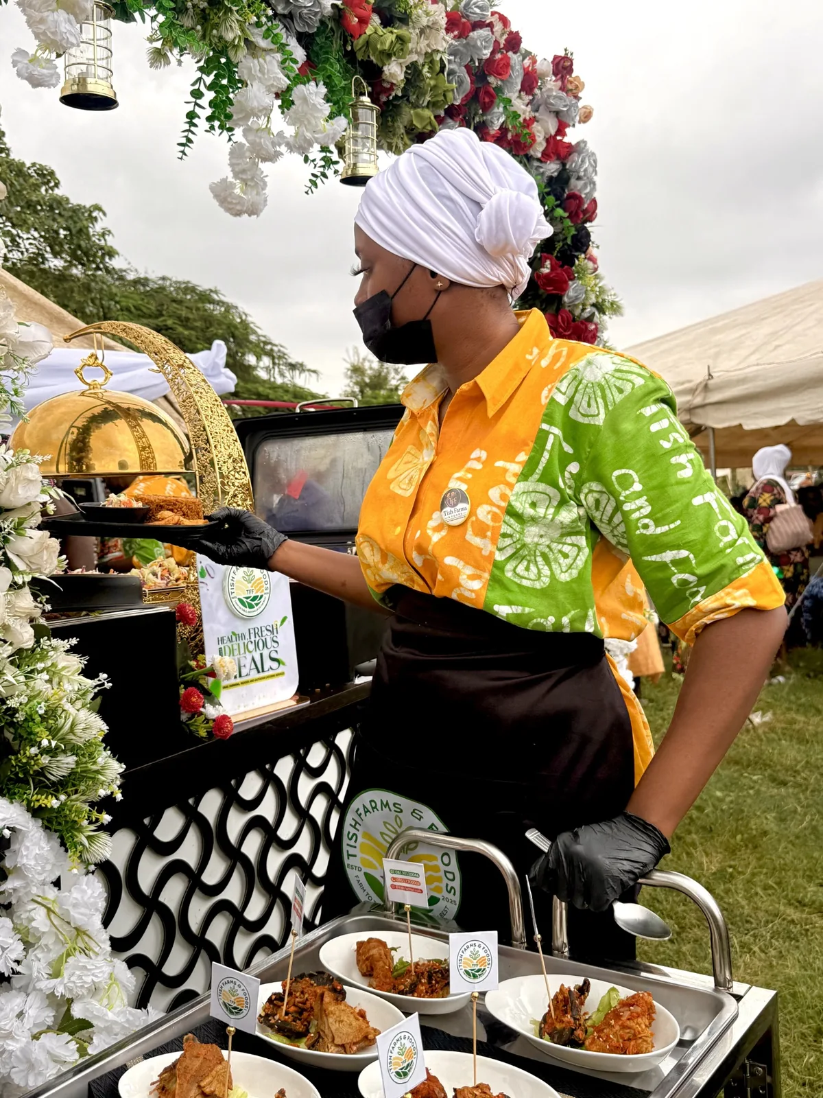 Tish Farms and Foods team serving rice at an event